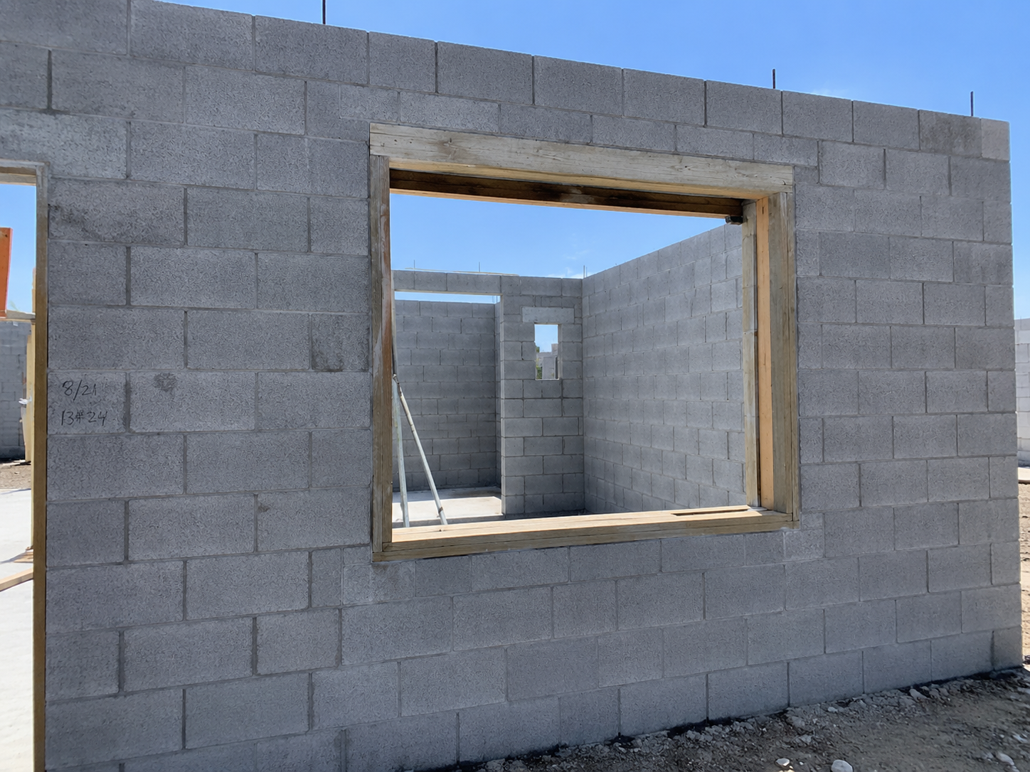 Window and door masonry openings measured in a Cape Coral concrete block home before window installation