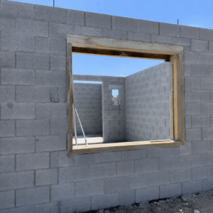 Window and door masonry openings measured in a Cape Coral concrete block home before window installation